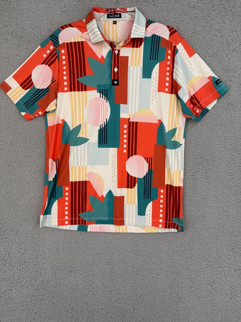 Bad Birdie Men’s Medium short sleeve polo golf shirt Retro Geo Red, Teal & Pink